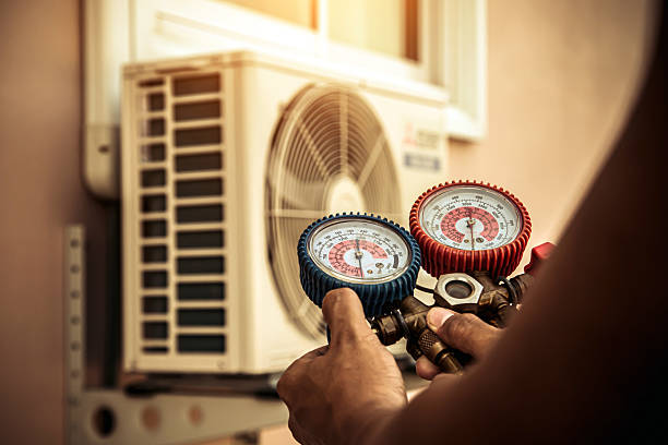 Professional Furnace Repair technician working in Washington, IL